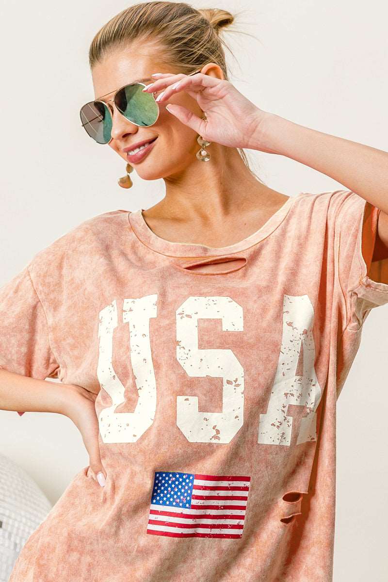 "Make a bold statement with our fearless fashion." Washed American Flag Graphic Distressed T-Shirt