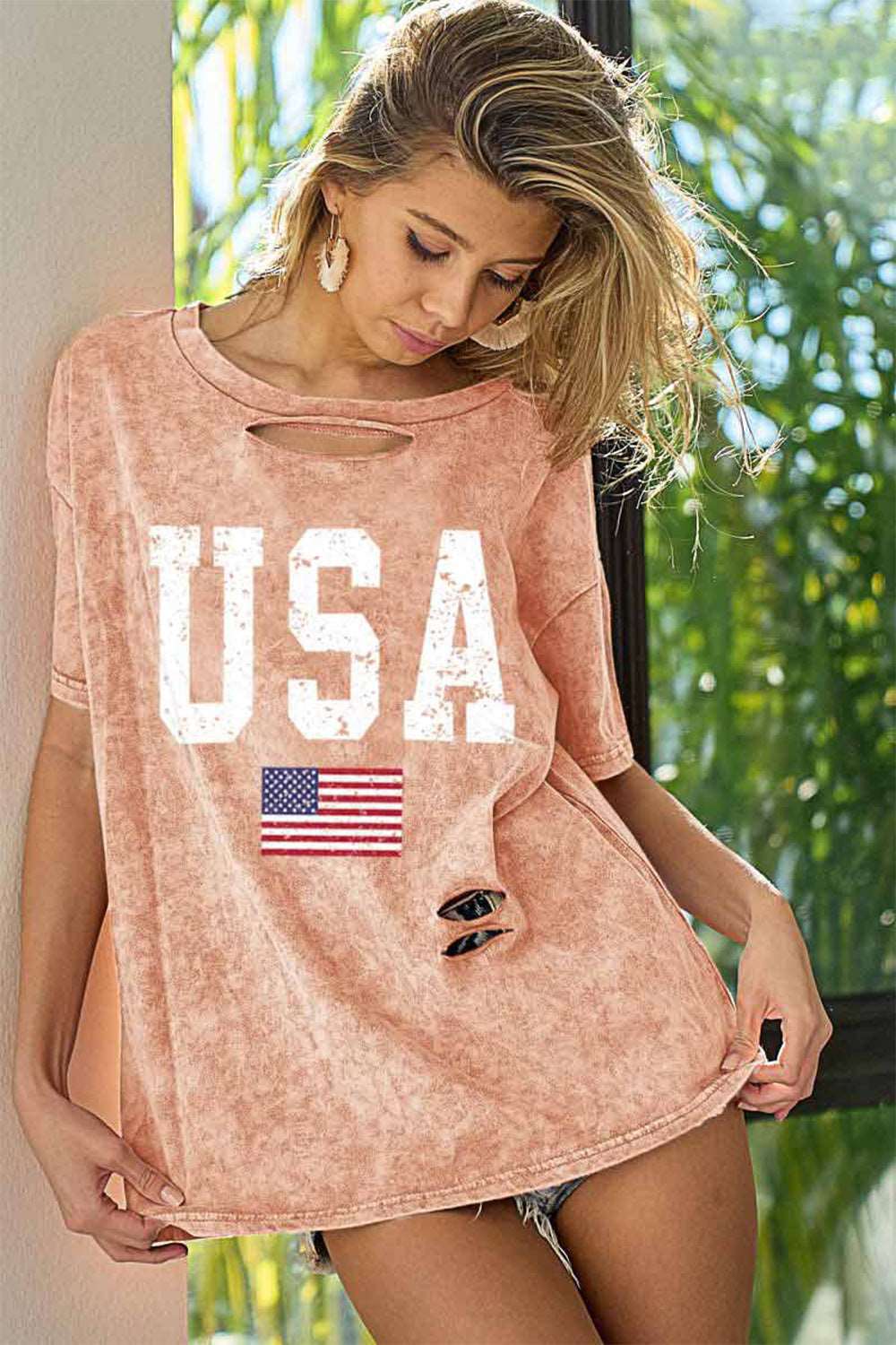 "Make a bold statement with our fearless fashion."  Washed American Flag Graphic Distressed T-Shirt