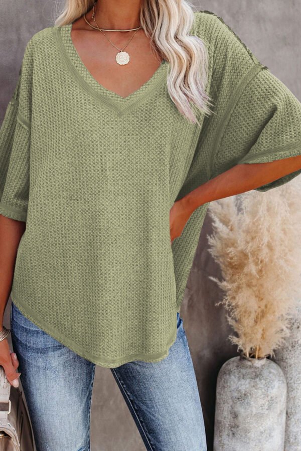 gray exposed seam half sleeve knitted v neck textured top