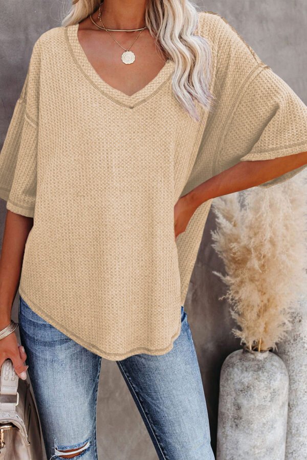 gray exposed seam half sleeve knitted v neck textured top