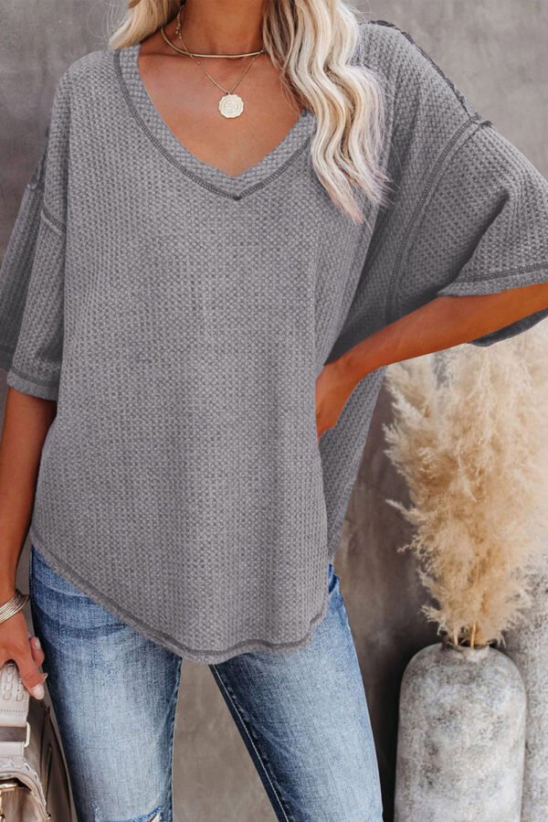 gray exposed seam half sleeve knitted v neck textured top