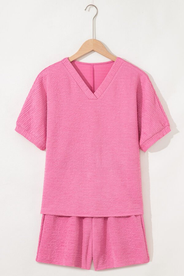 orange textured v neck t shirt and shorts set