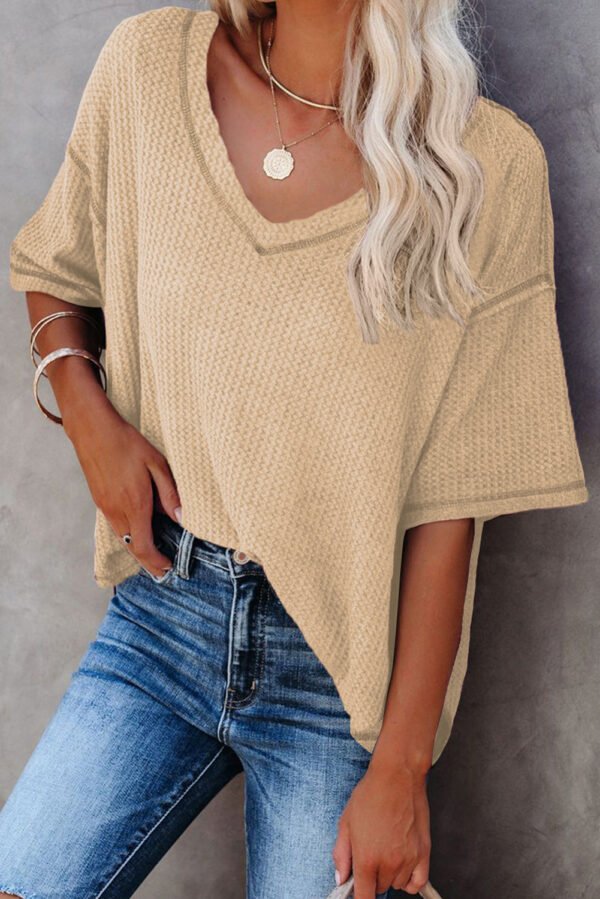 gray exposed seam half sleeve knitted v neck textured top